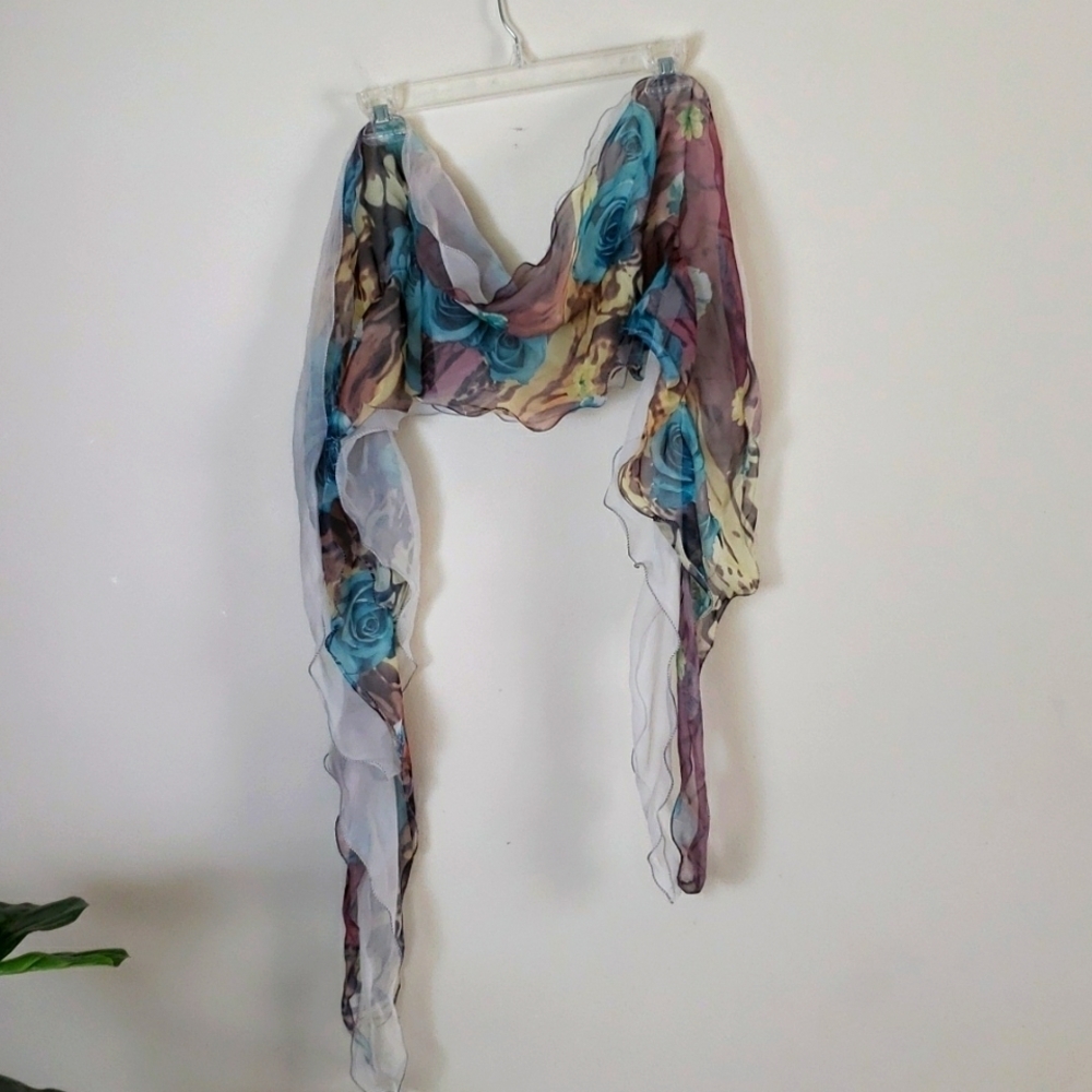 Fashion scarf with floral print and ruffles.